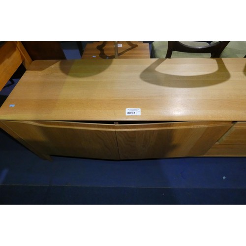 3091 - A 1990s vintage Ercol light wood sideboard with 2 doors and 2 drawers, approx 160cm wide. Please not... 