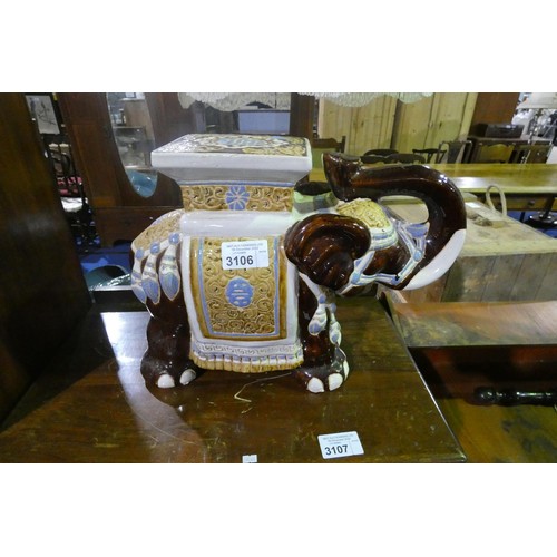 3106 - A decorative ceramic elephant seat