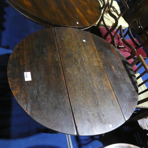 3158 - An early Oak oval topped gateleg table with turned supports