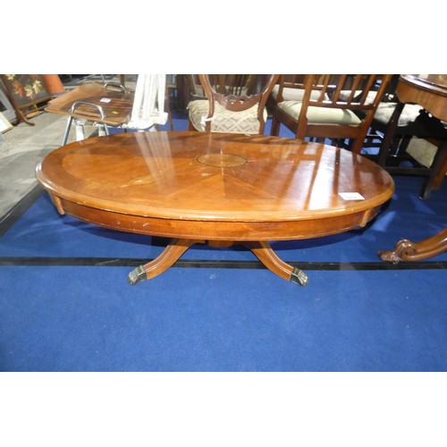 3162 - A marquetry inlaid mahogany oval topped coffee table