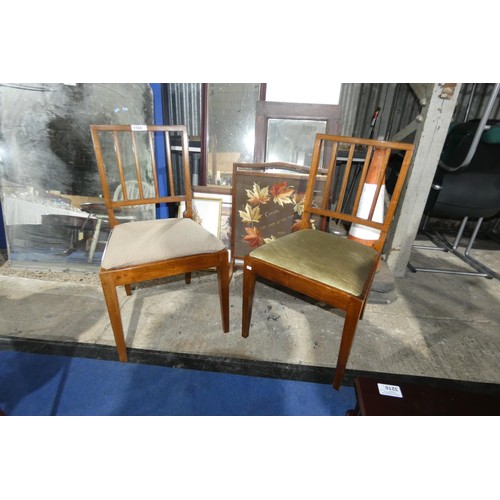 3168 - A pair of light mahogany dining chairs with rail backs and lift out seats