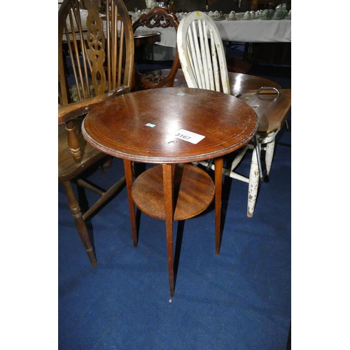 3167 - A mahogany circular topped occasional table with shelf under, an oak Windsor wheel backed elbow chai... 