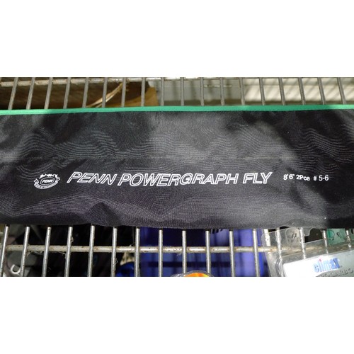 A Penn Powergraph two piece 8ft 6 inch fly fishing rod supplied in a soft  carry case with a Fladen p