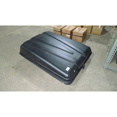 2096 - A black plastic vehicle roof box by Auto Plas approx 130 x 100 x 30cm deep - Four universal mounting... 