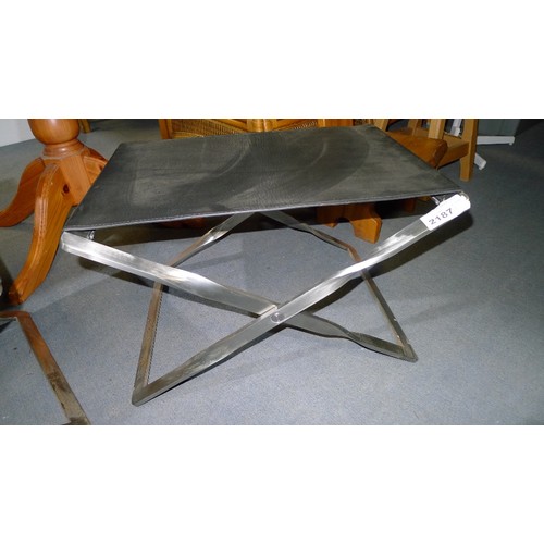 2187 - A steel and black leather folding stool