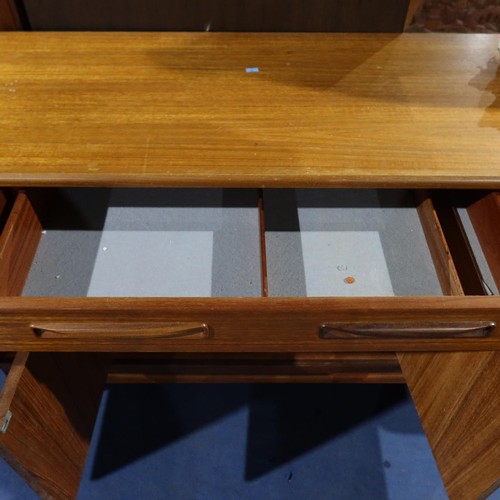 3070 - A 1970s vintage teak sideboard with 3 top drawers and 4 cupboards under, approximately 152cm wide. N... 