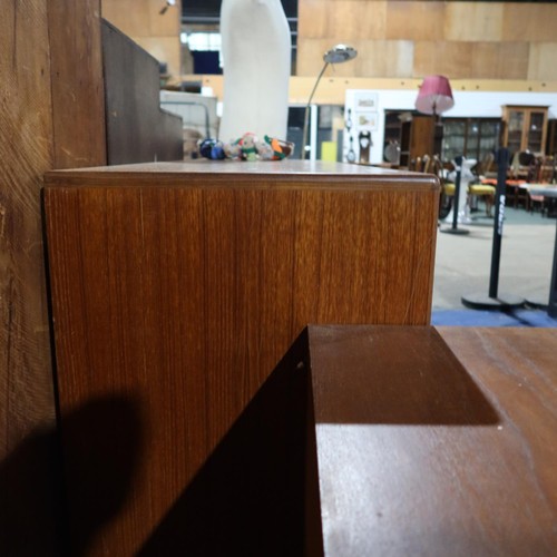 3070 - A 1970s vintage teak sideboard with 3 top drawers and 4 cupboards under, approximately 152cm wide. N... 