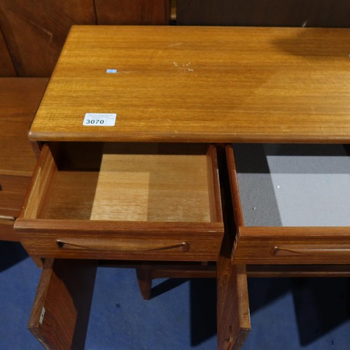 3070 - A 1970s vintage teak sideboard with 3 top drawers and 4 cupboards under, approximately 152cm wide. N... 