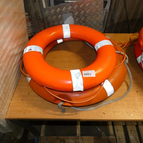 5003 - 2 orange plastic lifebuoy rings