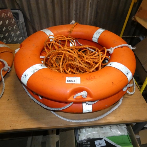 5004 - 2 orange plastic lifebuoy rings