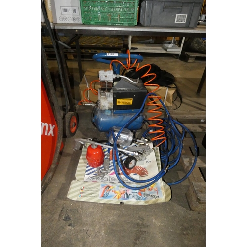 5106 - 1 air compressor 240v (no make visible) supplied with 2 lengths of air hose and 4 air tools