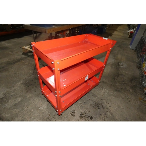 5123 - A red metal three tier trolley