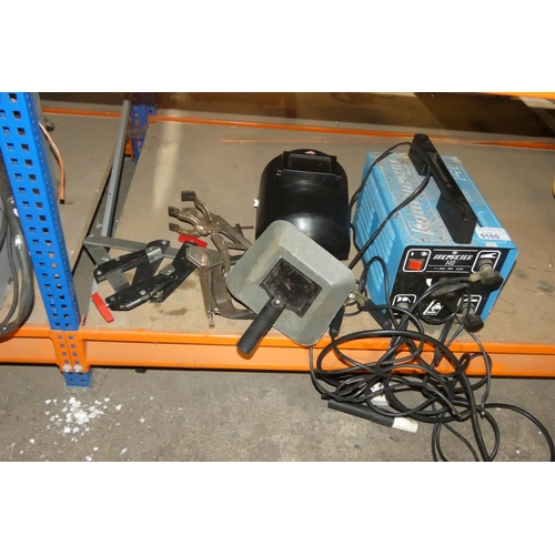 5165 - A welder by Arcmaster type 140 240v, 2 welding masks and 5 various clamps