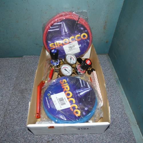 5194 - 1 box containing a quantity of oxyacetylene gauges and hose