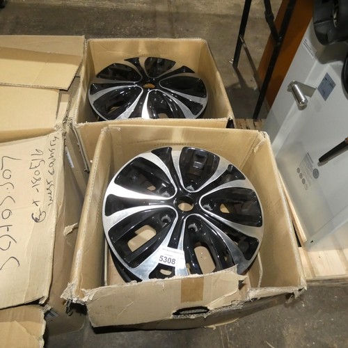 5308 - 4 x black / silver coloured alloy wheels - 5 stud and believed to suit VW