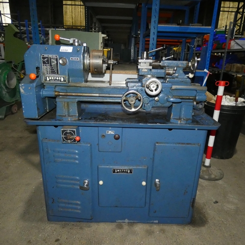 5356 - A Boxford metal turning lathe on cabinet, 3ph, bed length approx 65cm, supplied with a three jaw chu... 