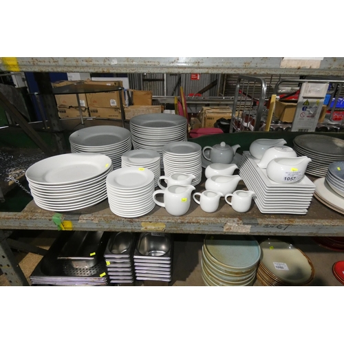 1057 - A quantity of various white hotel grade crockery by Australian Fine China inc plates etc. Contents o... 