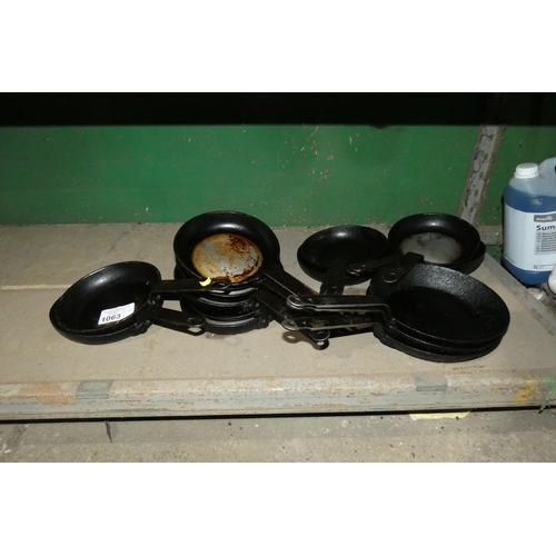 1063 - A quantity of various frying pans