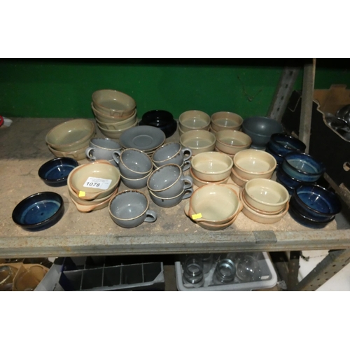 1078 - A quantity of various stoneware style crockery by Rustico, Porcelite etc. Contents of 1/2 a shelf