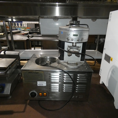 A commercial stainless steel ice cream making machine by Robot Coupe