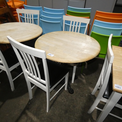 1264 - A round wooden cafe type table approx 80cm and 2 wooden black upholstered chairs