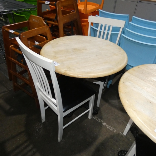 1265 - A round wooden cafe type table approx 80cm and 2 wooden black upholstered chairs