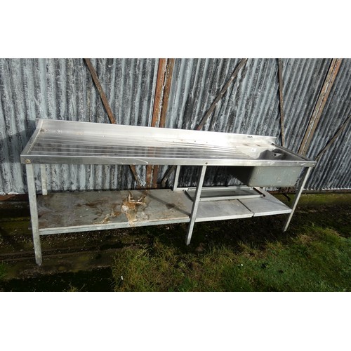 1003 - A commercial stainless steel single bowl sink unit with shelf beneath, approx 2.44m