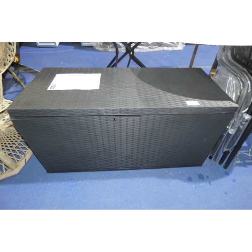 A black synthetic rattan garden storage box approx 117 x 51 x 59cm high