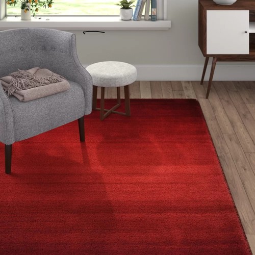 353 - A Knag red rug approx 190 x 290cm RRP £519