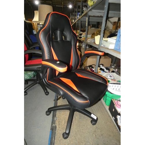 2126 - A black / red upholstered gaming chair by Nautilus