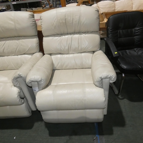 2162 - A cream upholstered manually reclining armchair