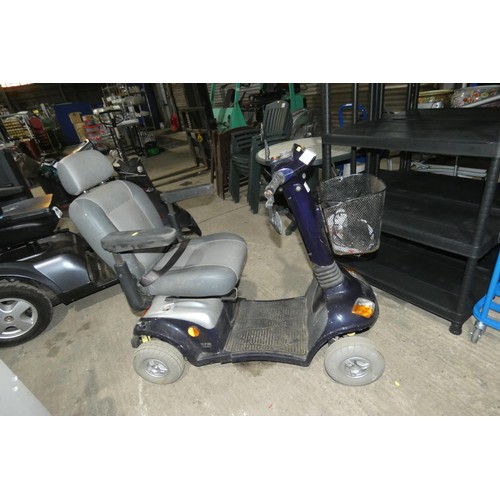 2051 - A Strider battery powered mobility scooter supplied with a key and a mains battery charger. Tested w... 