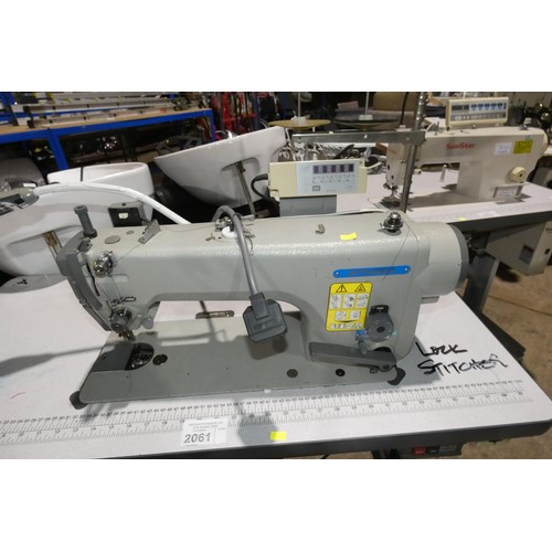 2061 - A Mitsubishi LS2-1780 industrial lockstitch sewing machine 240v fitted with a XC-G10 control unit an... 