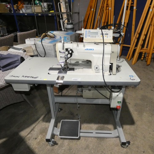 2065 - A Juki LH-3128-7 industrial twin needle sewing machine 240v fitted with a CP-230 control unit and a ... 