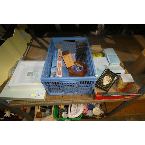 2117 - A quantity of various household and other items including ornaments, a battery charger 240v, money b... 