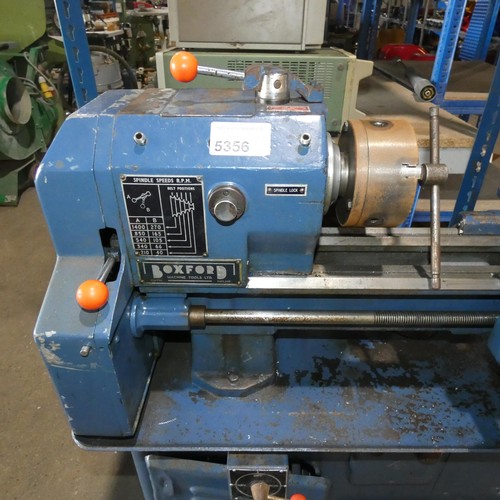 5356 - A Boxford metal turning lathe on cabinet, 3ph, bed length approx 65cm, supplied with a three jaw chu... 