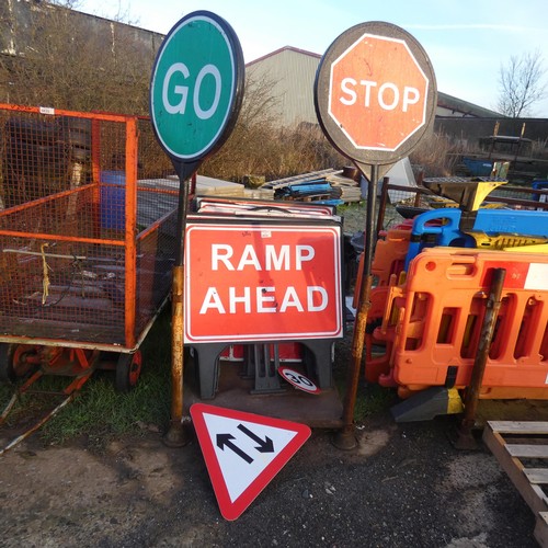 5834 - 1 stillage containing a quantity of various road signs (please note, stillage not included)