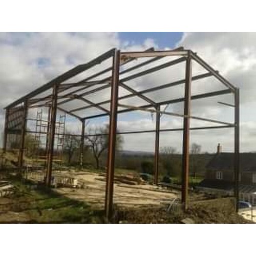 5868 - A steel framed shed consisting of 10 uprights, 8 braces and 18 purlins, measuring approx 45ft x 20ft