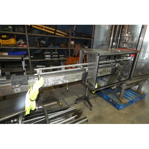 5756 - A large industrial bottling machine with many stainless steel parts believed to be by Filler Sales a... 