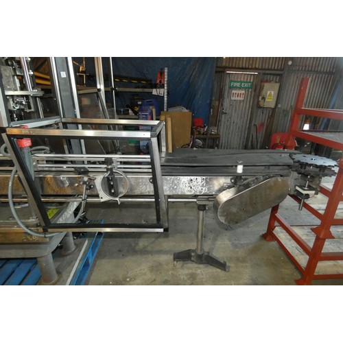 5756 - A large industrial bottling machine with many stainless steel parts believed to be by Filler Sales a... 