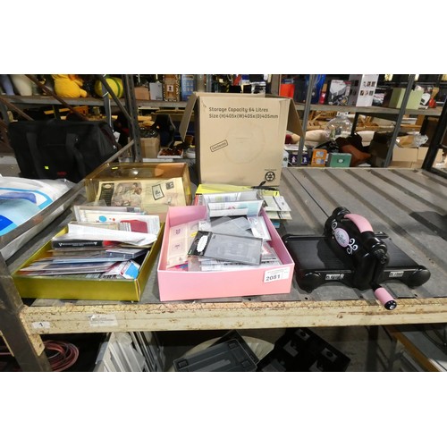 2081 - A Sizzix Big Shot die cutting machine and a quantity of various accessories including cutting dies a... 