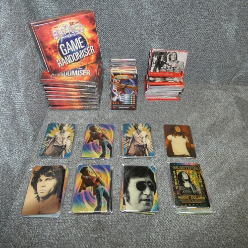 674 - A quantity of various Metallogloss Woodstock Generation Rock poster cards, Battles In Time cards, an... 