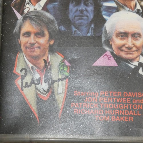 676 - A vhs cassette of Doctor Who - the Five Doctors signed by Peter Davison