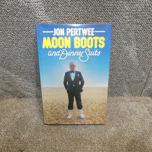 679 - A first edition? Moon boots and dinner suits by Jon Pertwee, unsigned