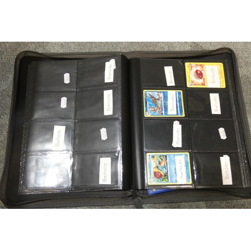 691 - A quantity of various Pokémon collectible items inc Trading cards, posters, ultimate guard folder wi... 