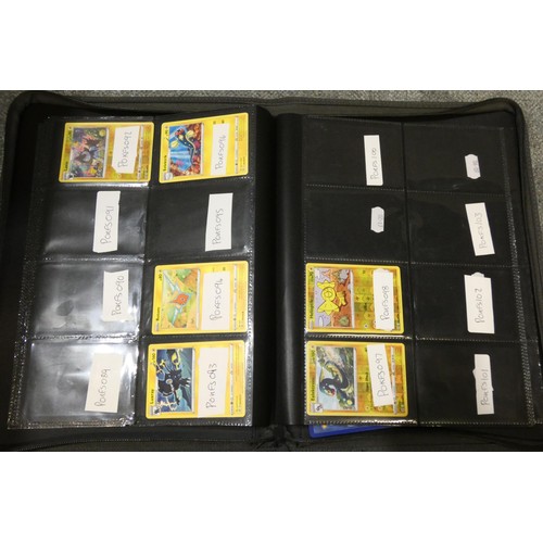 691 - A quantity of various Pokémon collectible items inc Trading cards, posters, ultimate guard folder wi... 