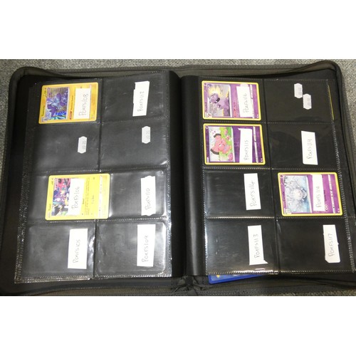 691 - A quantity of various Pokémon collectible items inc Trading cards, posters, ultimate guard folder wi... 