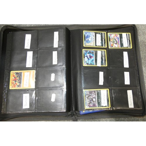 691 - A quantity of various Pokémon collectible items inc Trading cards, posters, ultimate guard folder wi... 