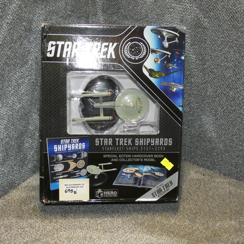 695b - An Eaglemoss hero collector box containing a model of the USS Enterprise and special edition book.