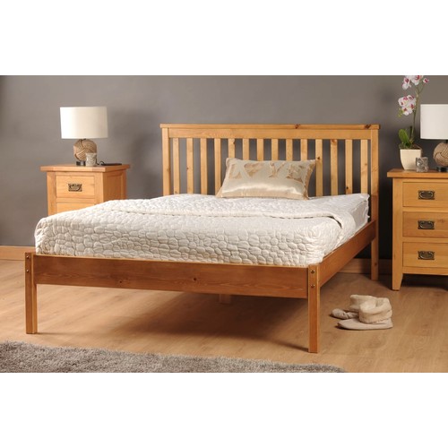 1030 - A Jaclin solid wood bed frame approx 4ft 6inch wide RRP £134. Boxed, requires assembly and no mattre... 